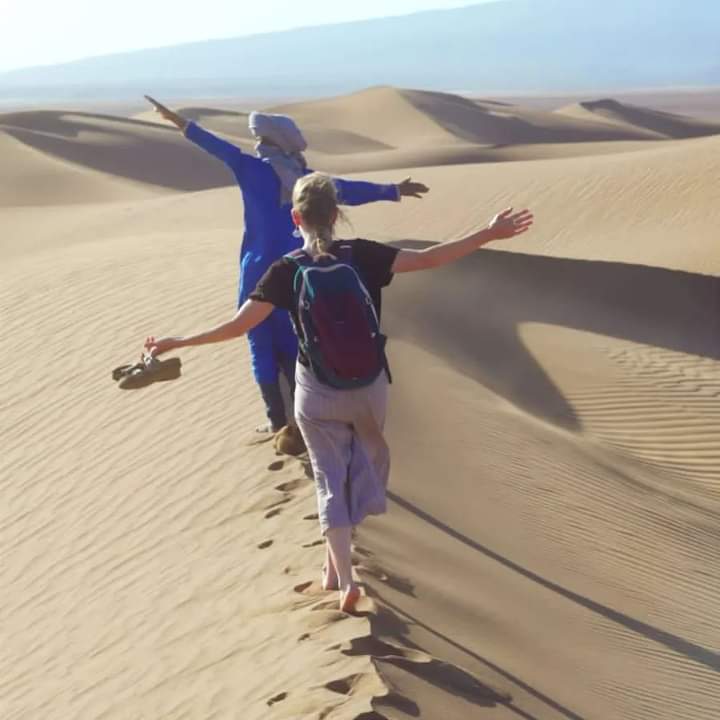 this is a img of desert with a man and women